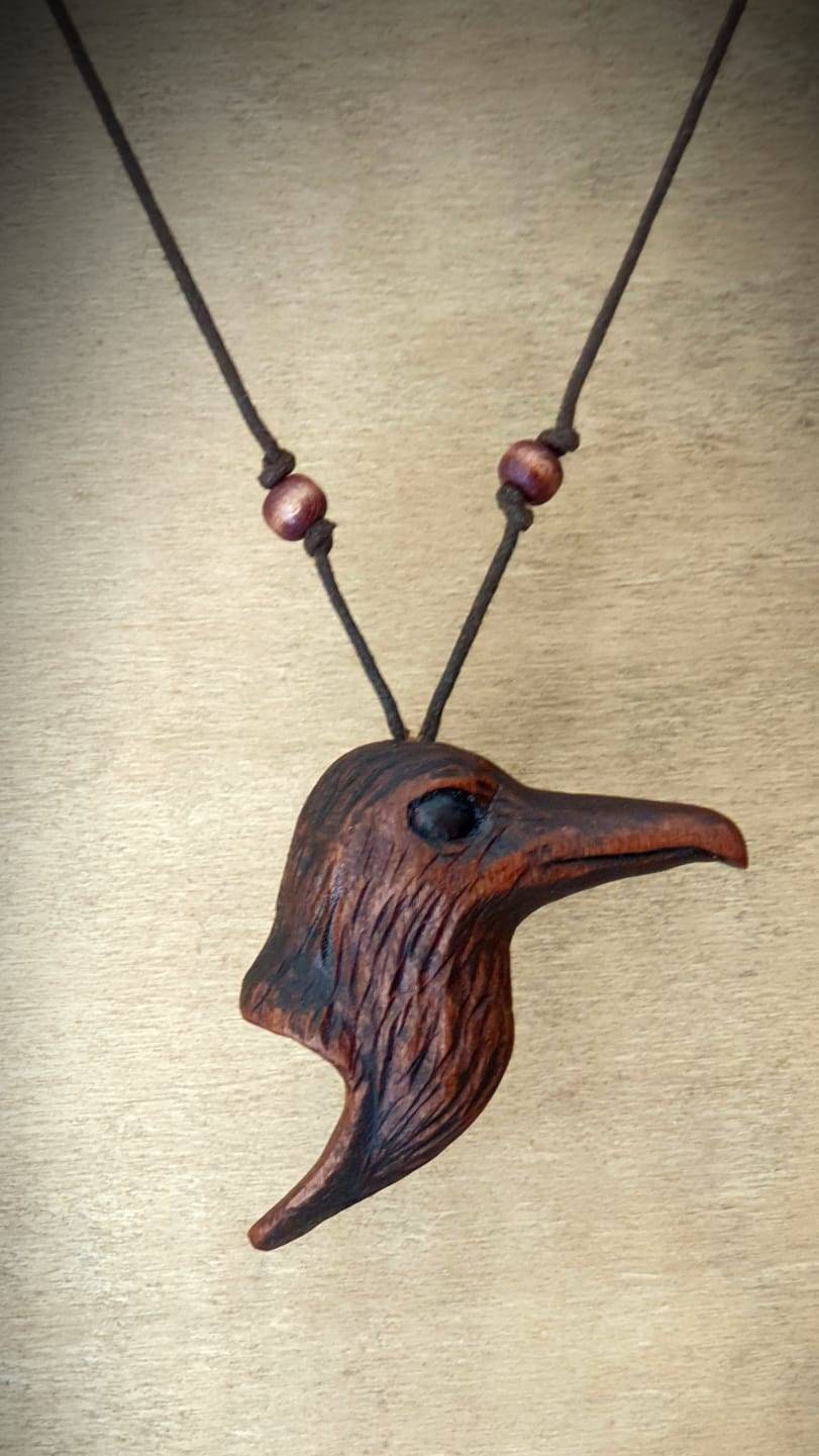 Handmade Crow-shaped Carved Pendants with Symbolic Meaning - Unique and Mystical Jewelry