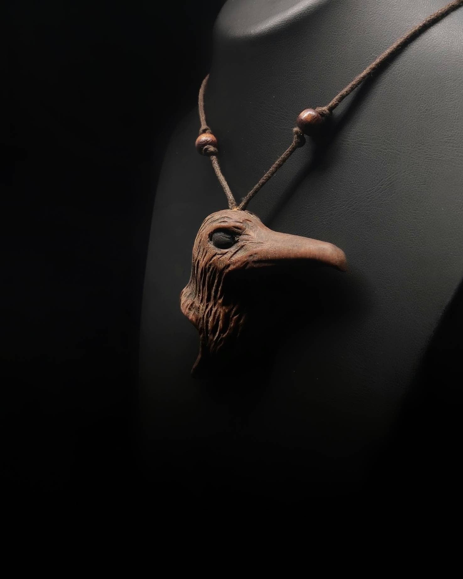 Handmade Crow-shaped Carved Pendants with Symbolic Meaning - Unique and Mystical Jewelry
