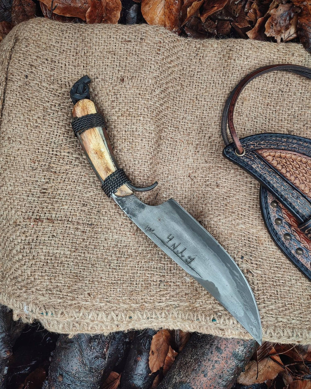 Custom handmade hand forged blacksmith primitive knife with leather sheath