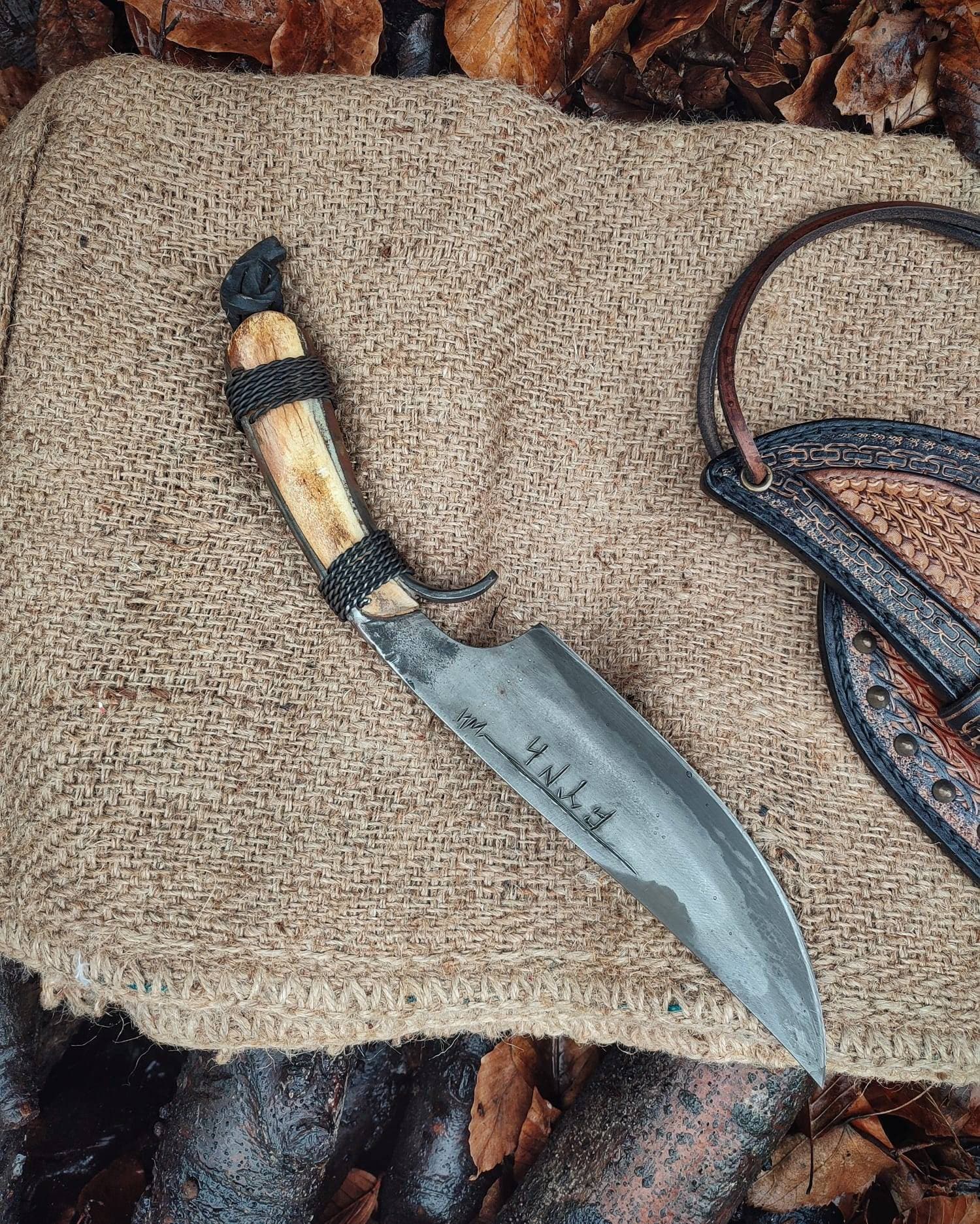 Custom handmade hand forged blacksmith primitive knife with leather sheath