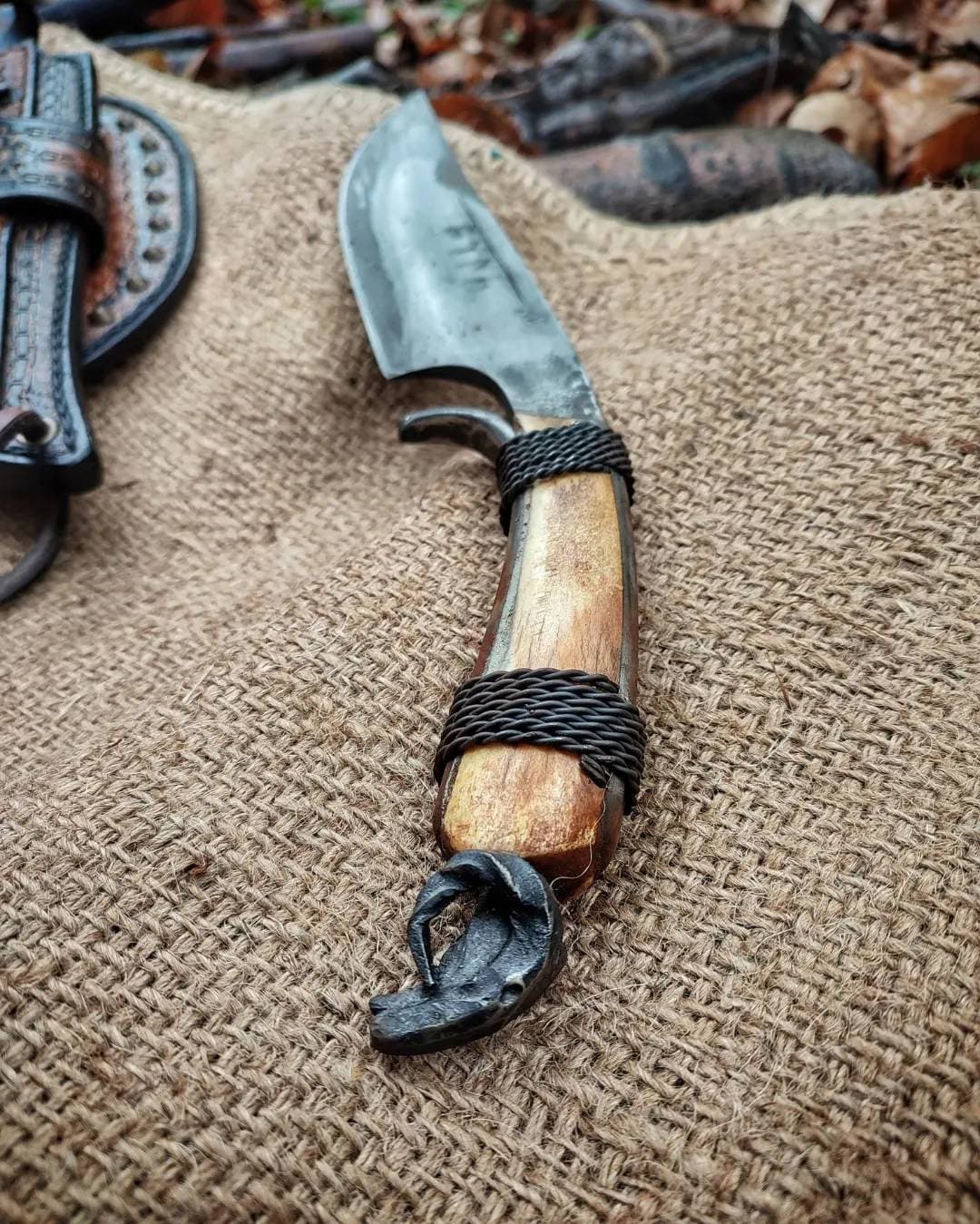 Custom handmade hand forged blacksmith primitive knife with leather sheath