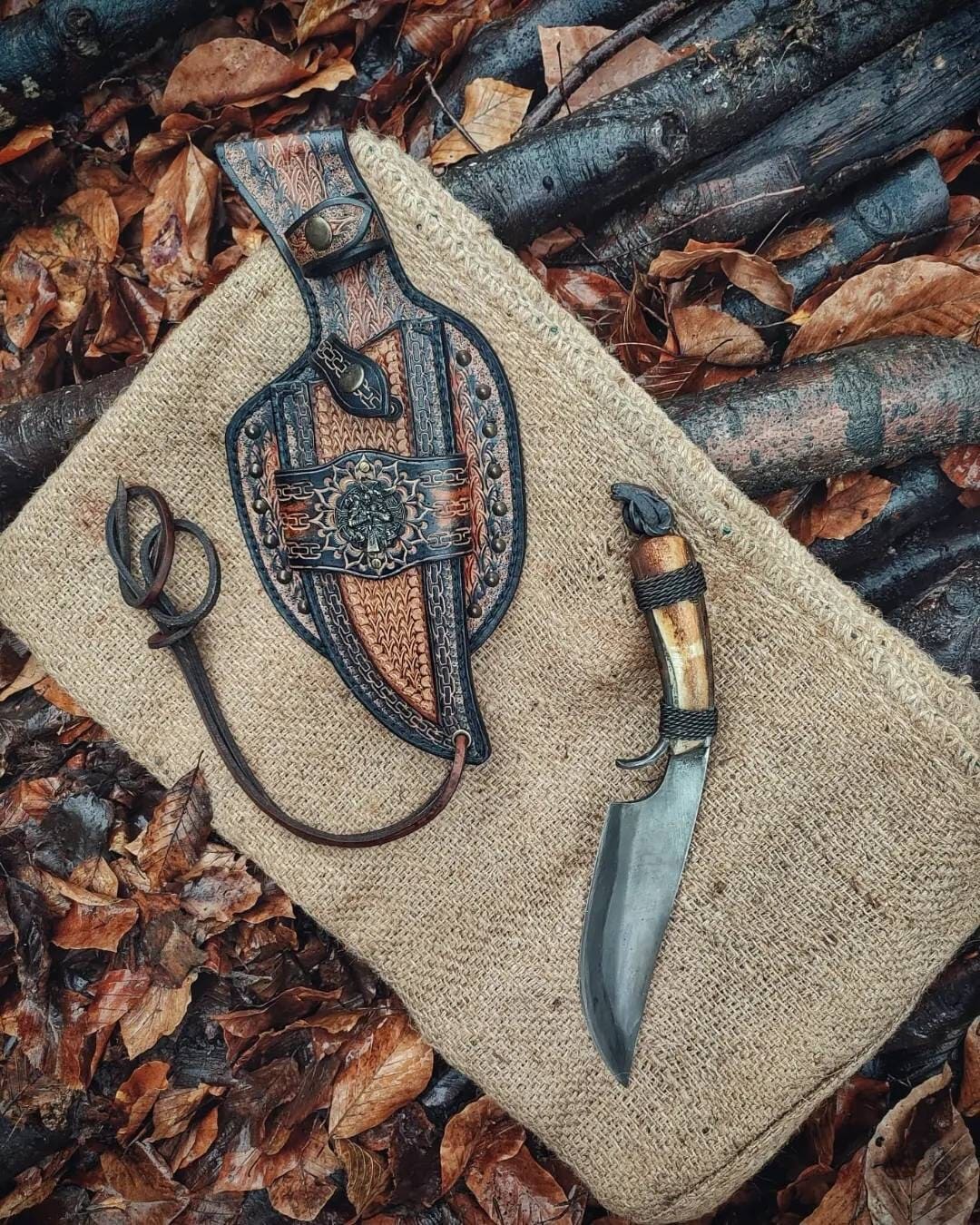Custom handmade hand forged blacksmith primitive knife with leather sheath