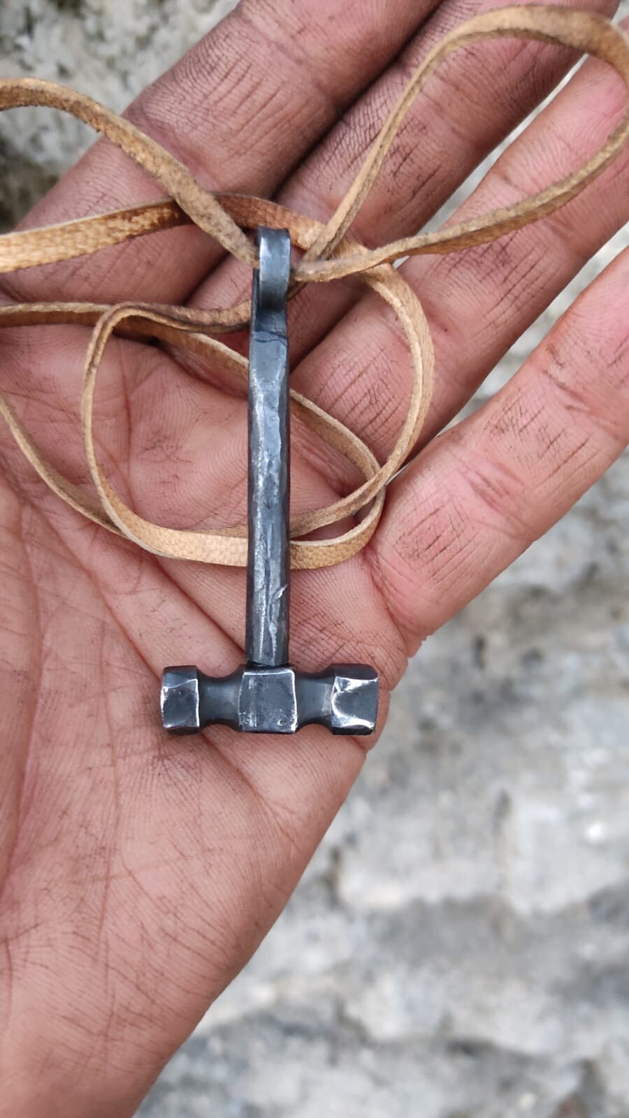 Handcrafted Steel Necklaces with Hammered Hammer Figures: Forging Hot Iron Using Traditional Techniques