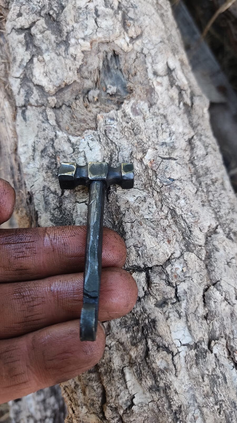 Handcrafted Steel Necklaces with Hammered Hammer Figures: Forging Hot Iron Using Traditional Techniques