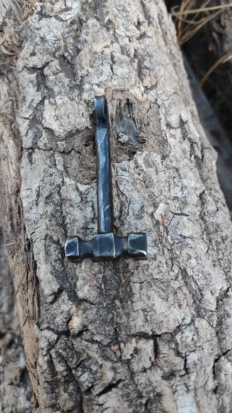 Handcrafted Steel Necklaces with Hammered Hammer Figures: Forging Hot Iron Using Traditional Techniques