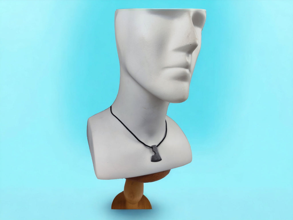 Handcrafted Steel Necklaces with Hammered Ax Figures: Forging Hot Iron Using Traditional Techniques