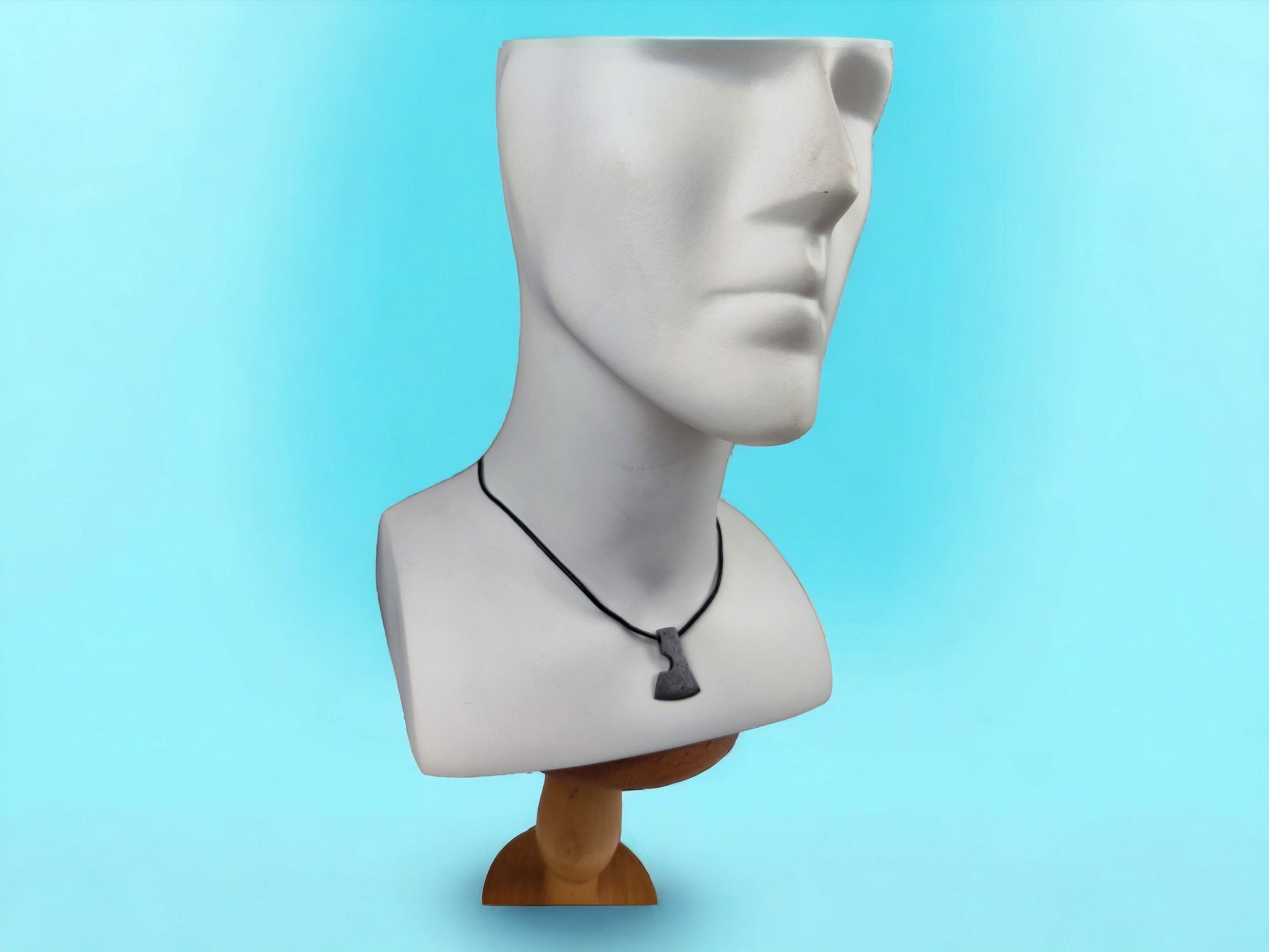Handcrafted Steel Necklaces with Hammered Ax Figures: Forging Hot Iron Using Traditional Techniques