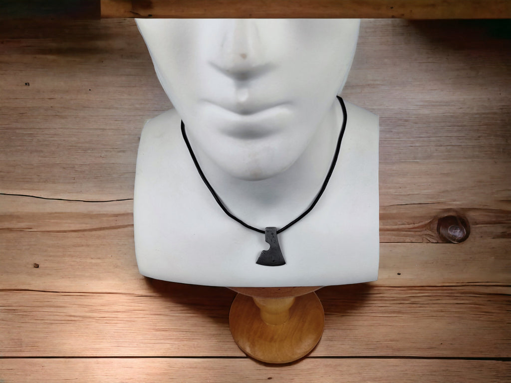 Handcrafted Steel Necklaces with Hammered Ax Figures: Forging Hot Iron Using Traditional Techniques