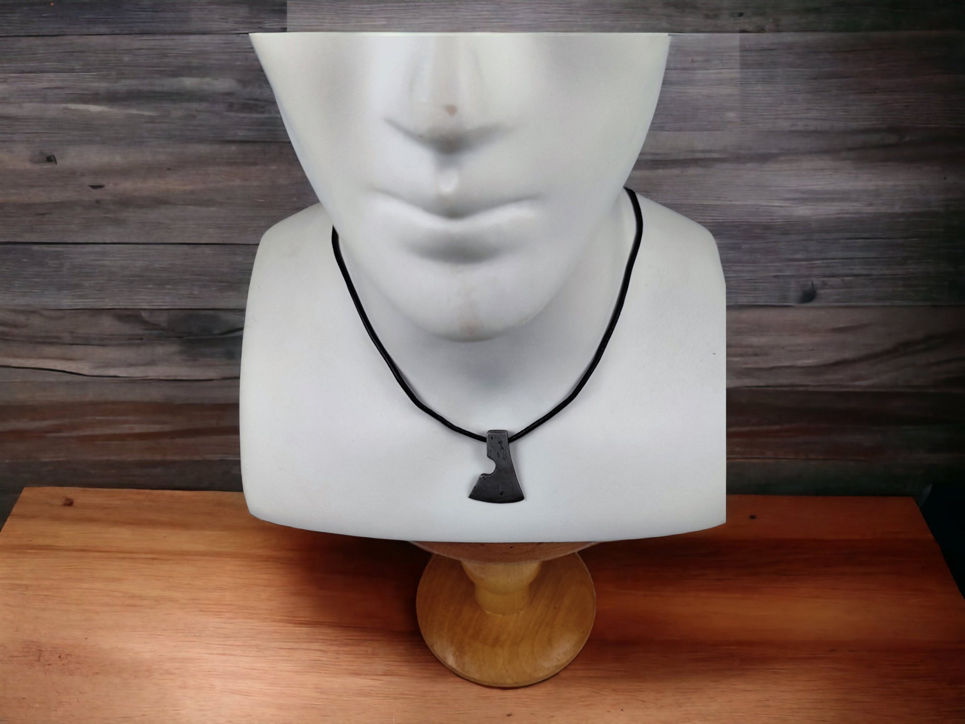 Handcrafted Steel Necklaces with Hammered Ax Figures: Forging Hot Iron Using Traditional Techniques
