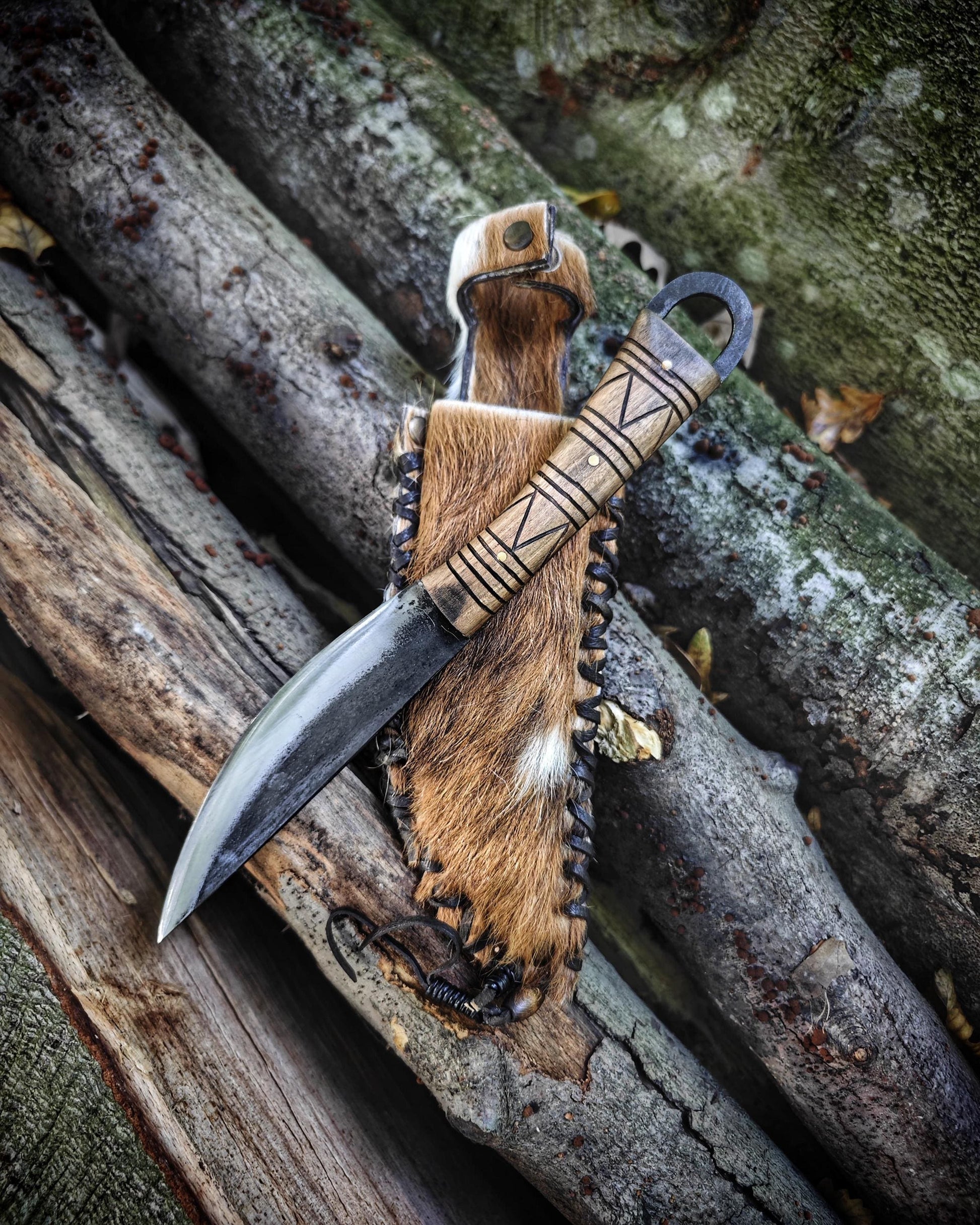 This custom order has been created especially for you and includes a hand-forged ax and a hand-forged knife,